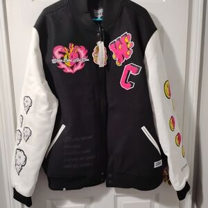 Trendy Black and White Varsity Jacket with Pink Accents